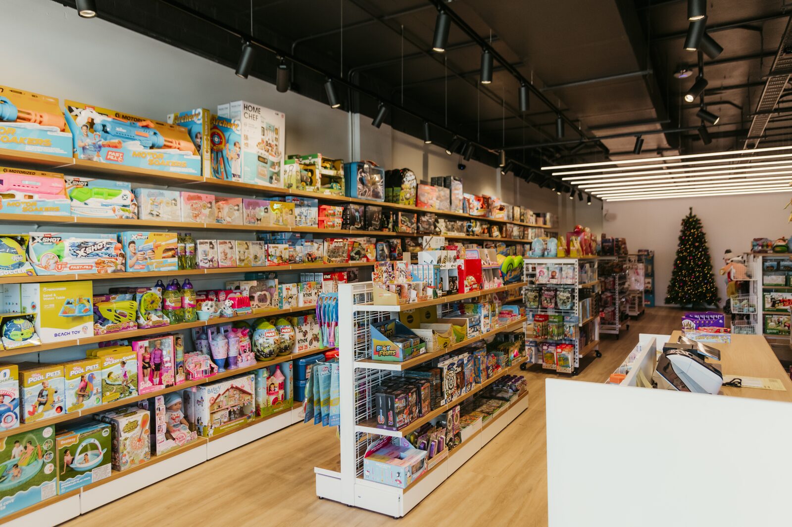 Inside the Wonderloft shop in Kingscliff, looking down the aisle of toys and games